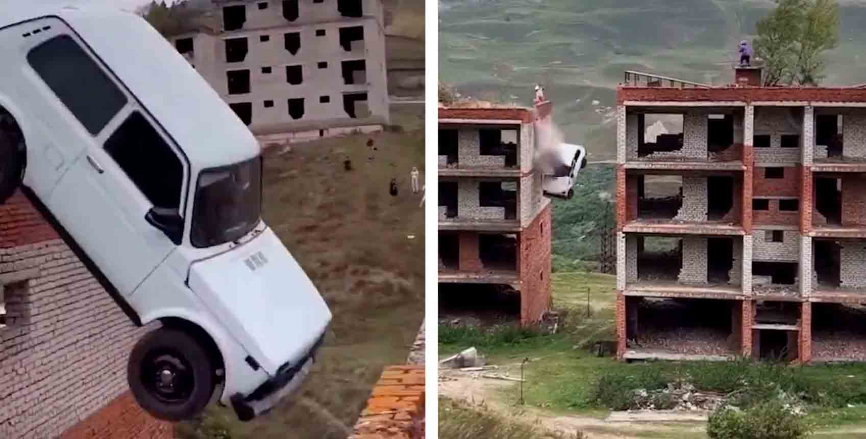 Video: Russer falder fra mere end 15 meters højde i forsøget på at krydse fra en bygning til en anden i bil