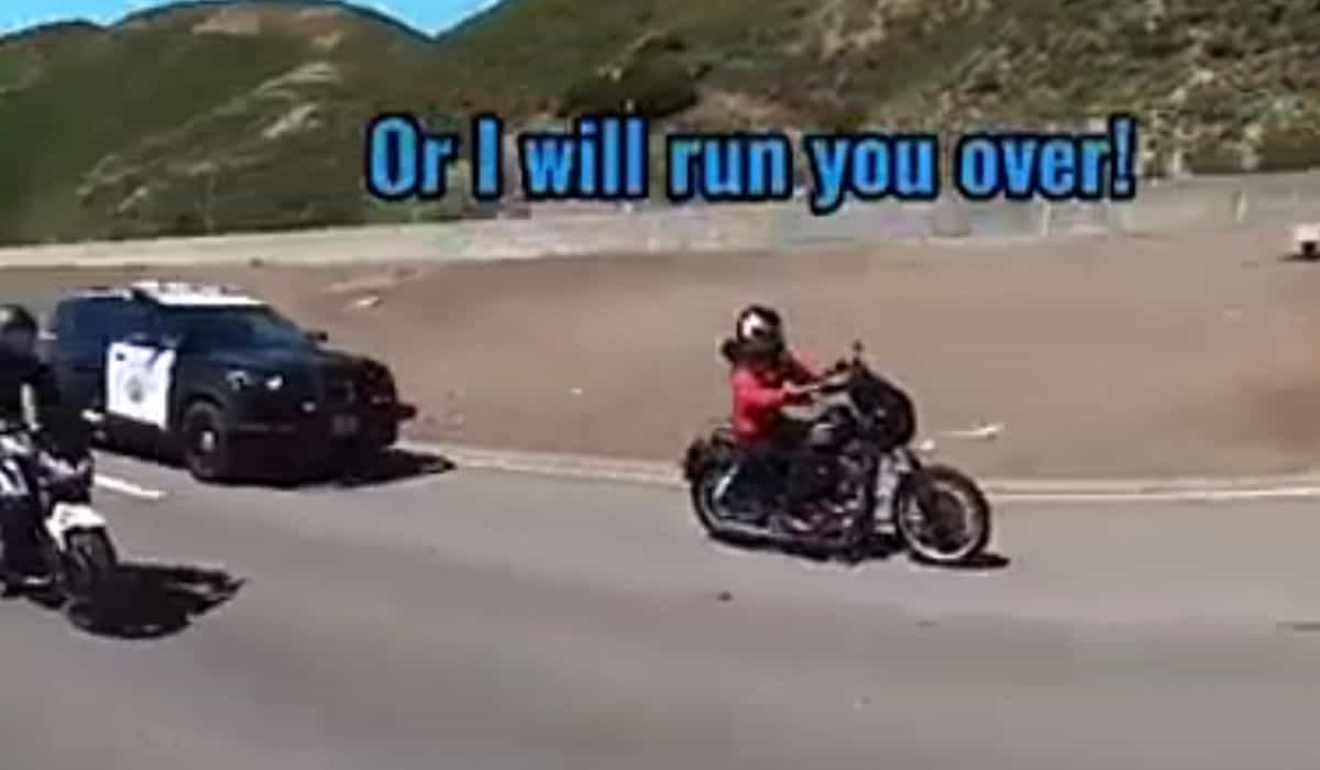 Video of police officer threatening to run over motorcyclist goes viral and sparks debate online