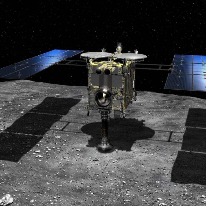 Illustratie van de Hayabusa2 die landt op een asteroïde (Afbeelding: JAXA)