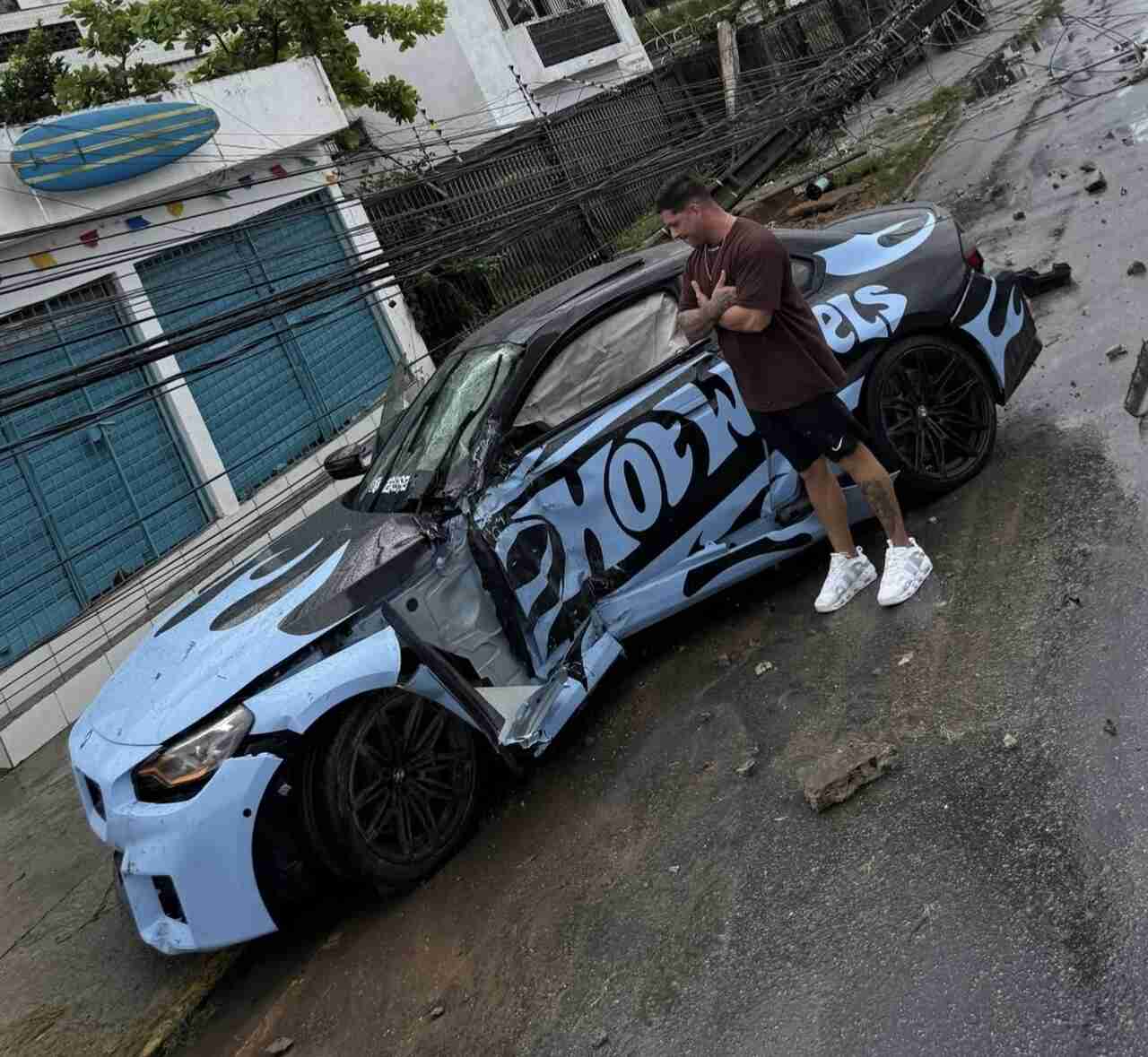 Luxury car of Brazilian influencer destroyed after skidding on wet road and knocking down pole