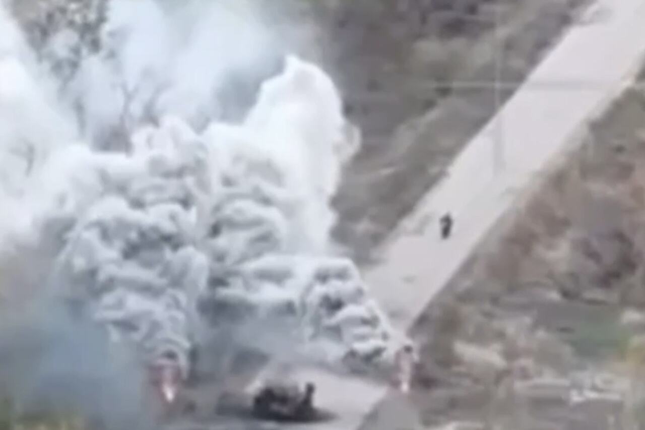 Russian troops collide with their own damaged equipment during an attempted advance