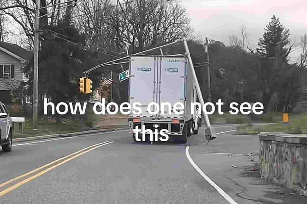 Truck driver caught with a traffic light hanging from the ceiling: 'How did he not see this?'