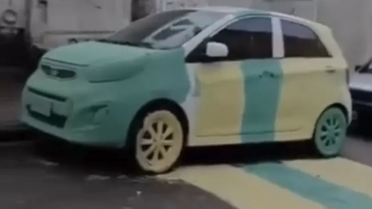 Pintura de ruas para a Copa acaba cobrindo carros estacionados