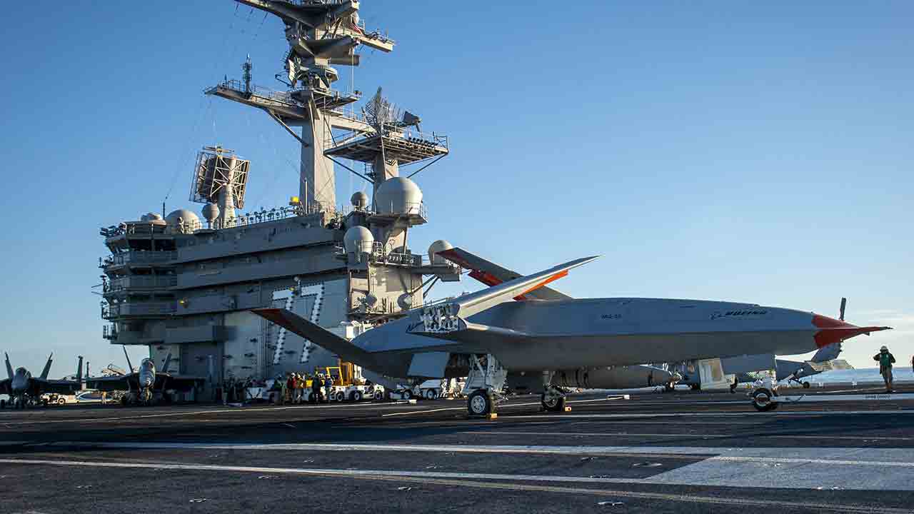 A Boeing MQ-25 unmanned aircraft receives operational instructions on the flight deck aboard the aircraft carrier USS George H.W. Bush (CVN 77). Photo: U.S. Navy / DVIDS